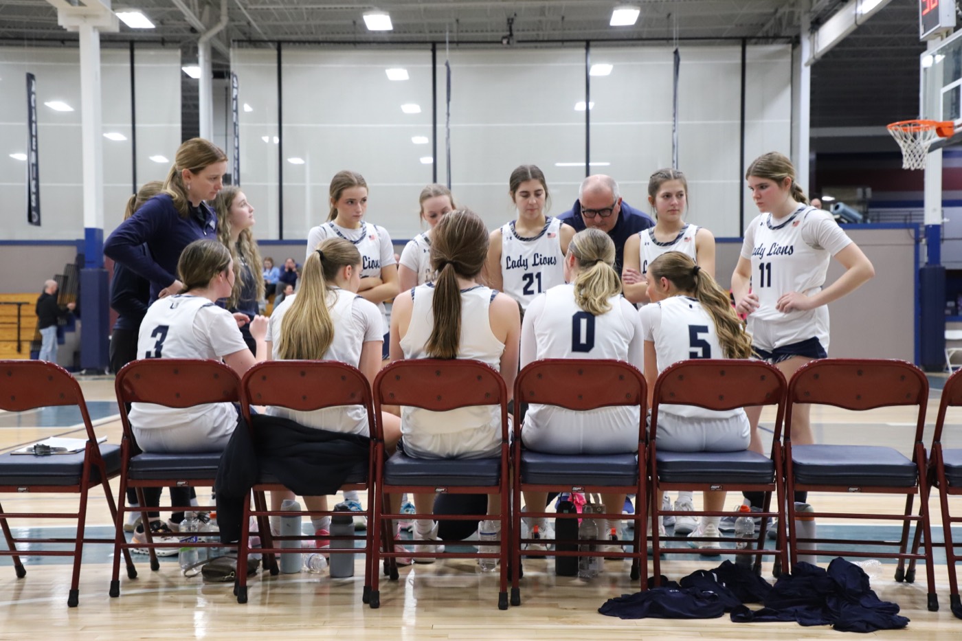 Unity football team huddle