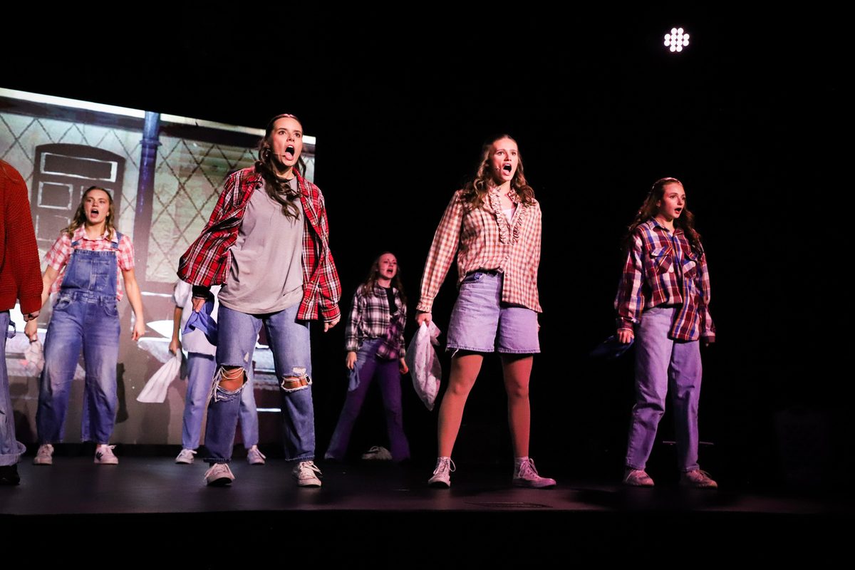 Students performing a number from Looking Back
