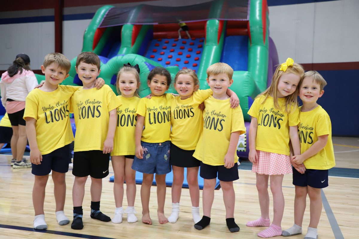 Preschool students lined up in their Field Day shirts